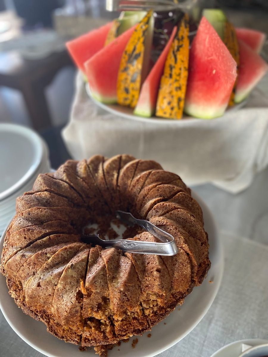 Home-baked cakes and seasonal fruits